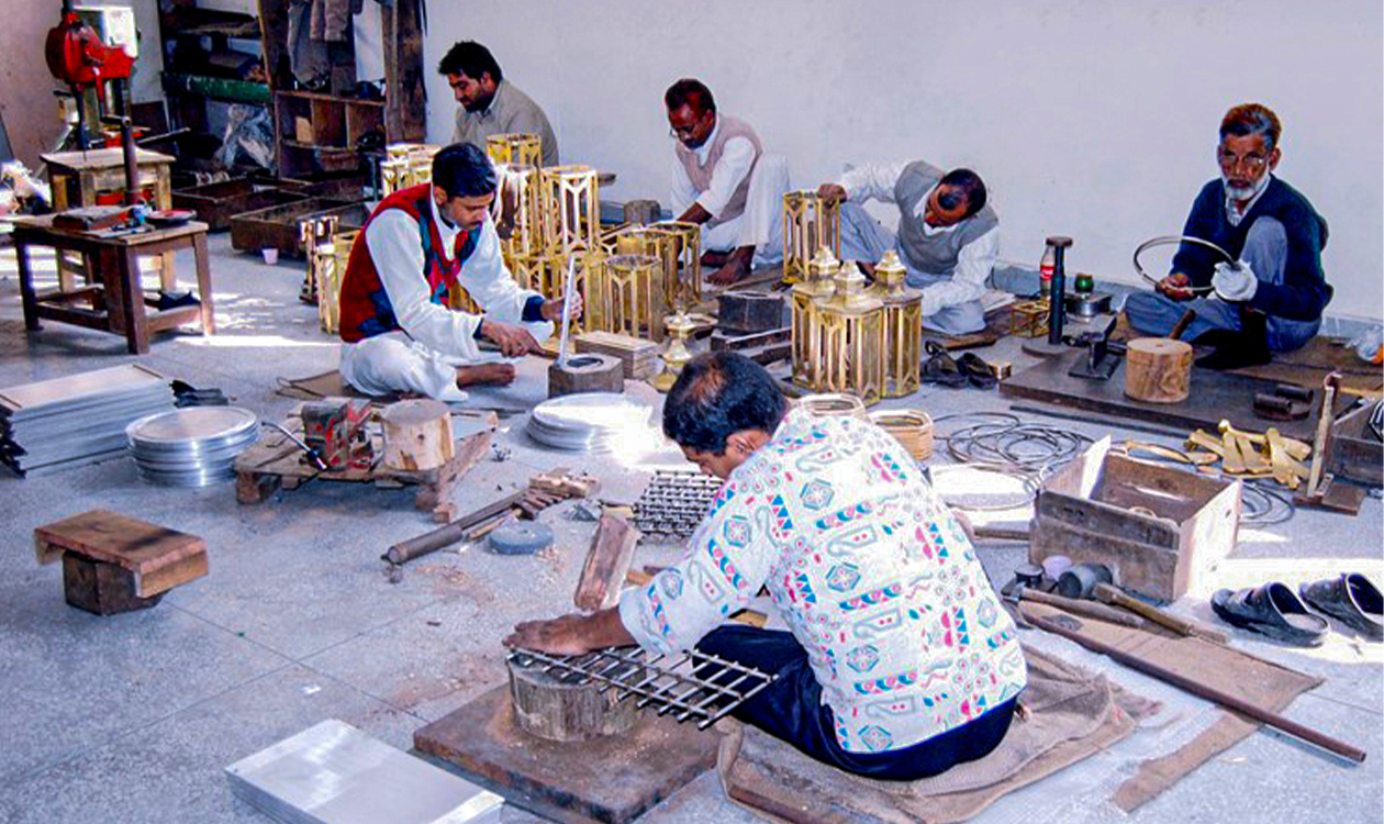 Artisans crafting products in the workshop
